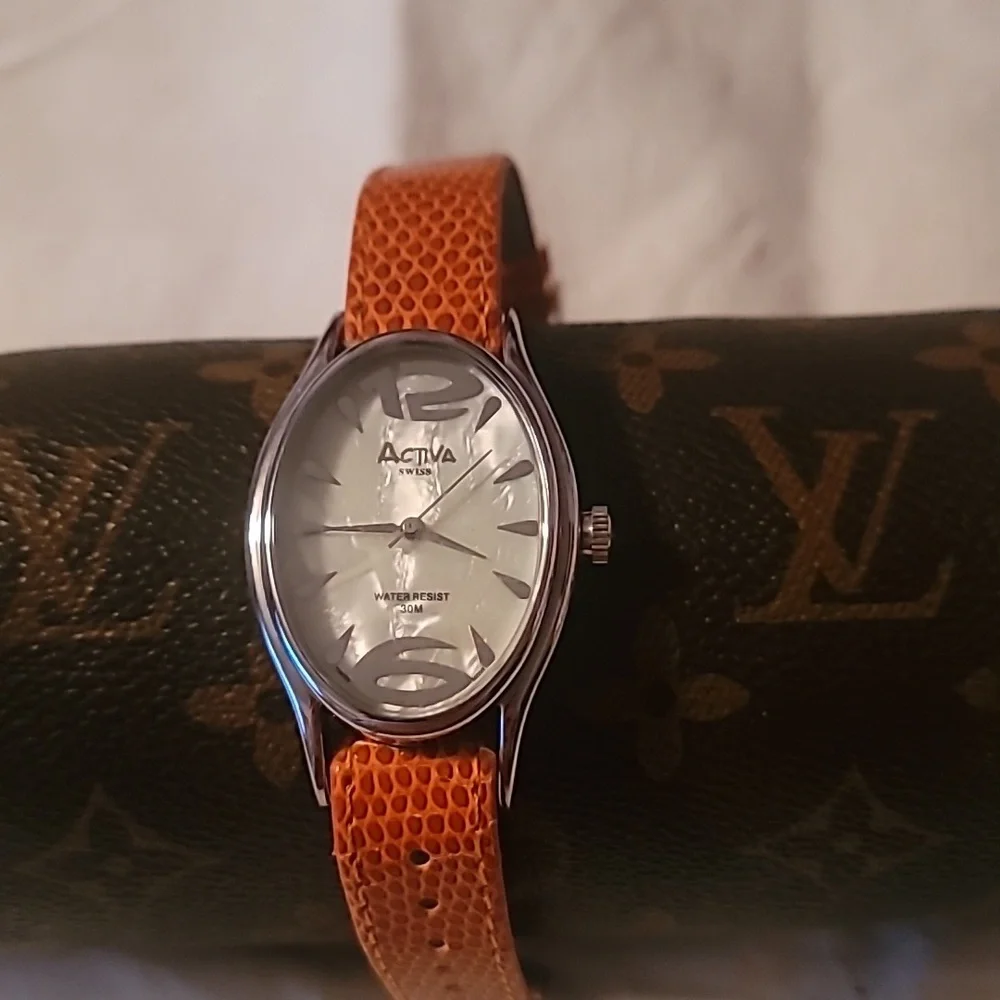 Activa By Invicta Swiss Watch Mother of Pearl Orange Reptile Embossed Band